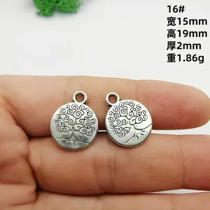 Detailed view of Tree of Life silver pendants with dimensions 15mm by 19mm and weight 1.86g