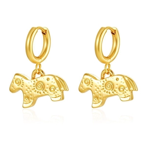 Detailed view of gold plated animal motif earrings with swirling textures on white background