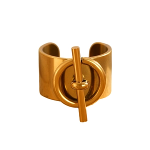 Polished 18K gold wide band cuff bracelet featuring a classic OT toggle closure design