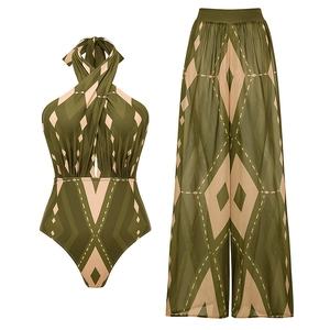 Detailed flat lay of olive green geometric print halter swimsuit and matching sheer wide-leg pants