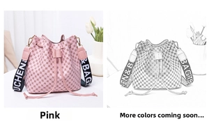 Detailed view of pink drawstring bucket bag with monogram print and woven shoulder strap