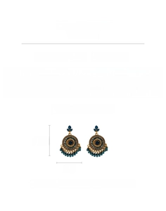 Detail view of vintage gold-tone earrings with blue rhinestones and beaded tassels