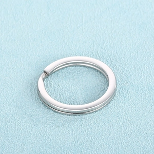 Close-up of polished stainless steel split ring connector for DIY keychains and jewelry