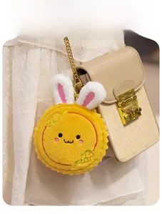 Cute yellow rabbit mooncake plush pendant with rabbit ears for bags and keychains