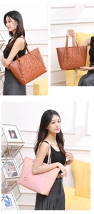 Detail of tote bag showing brown and pink quilted leather with metal tassel charm