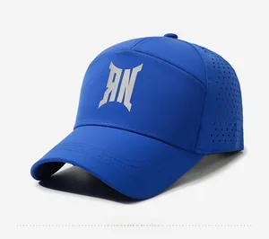 Detail of royal blue baseball cap featuring side laser-cut holes for breathability