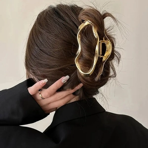 Cloud-shaped gold alloy hair claw clip with irregular wavy design for women