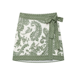 Women's paisley print mini skirt in cream and green with side tie-waist detail