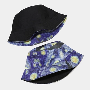 Reversible bucket hat featuring Van Gogh Starry Night oil painting and black canvas side