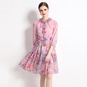 Pink floral chiffon dress with lantern sleeves and a cinched waist for women