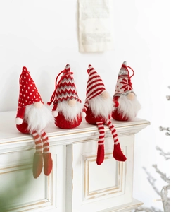 Detail of Christmas gnomes ornaments featuring knit patterns and white faux fur beards