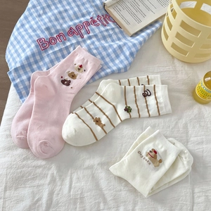 Three-pack of cute cotton crew socks with bear and dog patterns on a white background