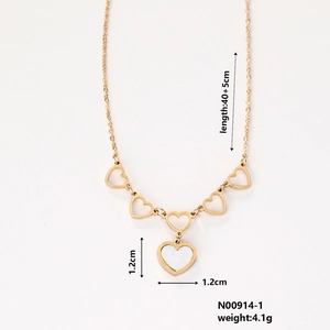 Close-up of gold stainless steel heart necklace with white mother of pearl pendant and measurements