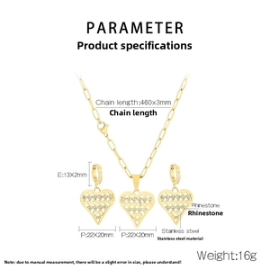 Detail view of gold stainless steel heart jewelry set with necklace and earrings