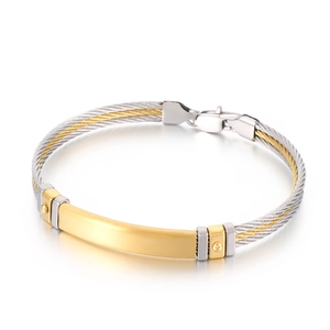 Two-tone woven stainless steel cable bracelet featuring a matte gold rectangular plate