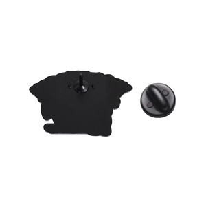 Detail of the black metal brooch back base and matching rubber butterfly clutch fastener