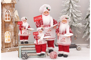 Detailed set of four Christmas chef Santa dolls with red plaid and Merry Christmas embroidery