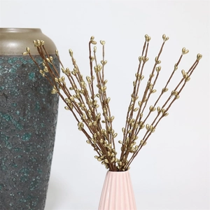 Golden artificial berry stems for Christmas tree and festive home vase decoration