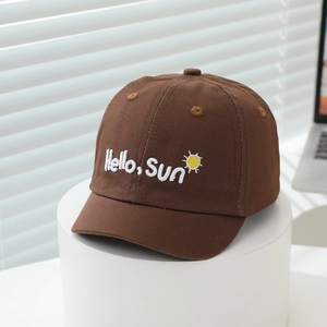 Detail of Hello Sun embroidery on brown cotton canvas toddler baseball cap