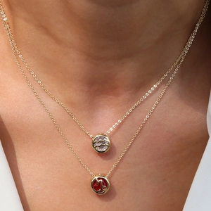 Gold double-layered brass necklace with zodiac pendants and colorful zircon stones