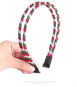 Detail of flexible double-row headband with red green white rhinestones for Christmas