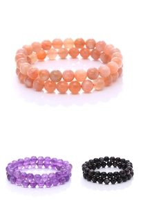 Detail view of natural amethyst, sunstone, and obsidian double-strand beaded bracelets
