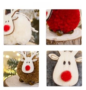 Close-up of reindeer Christmas ornaments with plush bodies and wooden faces in four colors