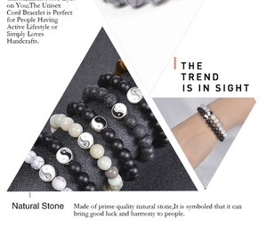 Macro view of natural stone Yin Yang bracelets featuring lava rock and matte agate beads