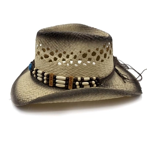 Retro hollow straw cowboy hat with burnished edges and ethnic beaded hatband