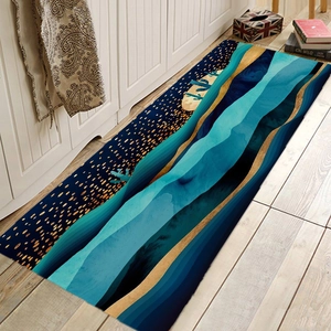 Abstract mountain flannel floor mat with non-slip backing in blue and gold for bathroom