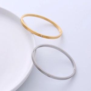 Sleek stainless steel open bracelets in gold and silver with square zircon inlay