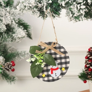 Detailed view of a Christmas snowman wooden door hanging ornament with burlap bow.