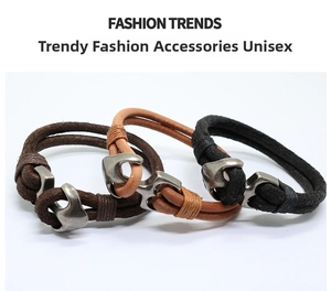 Detailed view of woven leather bracelets in black and brown with vintage anchor hooks