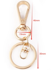 Detailed view of gold metal keychain components with lobster clasp and 30mm flat key ring