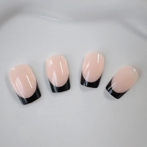 Classic French bow press-on nails in nude pink and black finish, square medium length