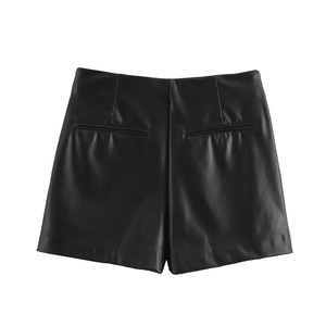 Back view of minimalist black PU leather shorts with elegant welt pockets and sleek finish