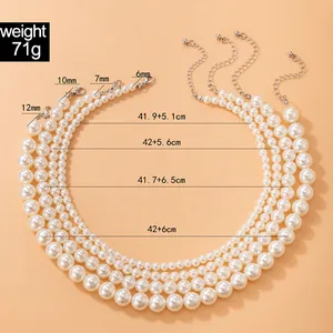 Size chart detail for layered pearl necklace with various pearl diameters and chain lengths