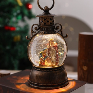 Detailed view of bronze nativity scene lantern featuring holy family on vintage books