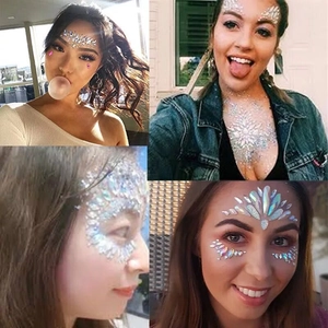 Face and body rhinestones gems stickers shown on skin for music festival makeup