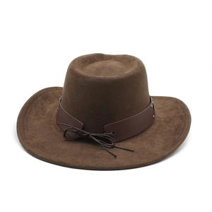 Detailed macro view of the dark brown felt cowboy hat with leather band and metal rivets