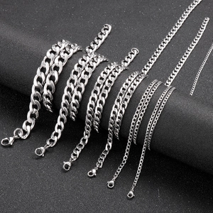 Hip hop silver stainless steel curb chain necklaces in multiple sizes on black background