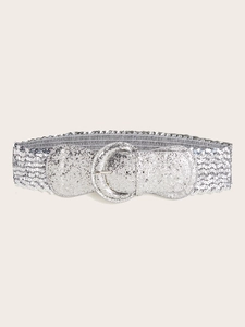 Detail of silver sequin elastic waist belt with a matching glitter buckle closure