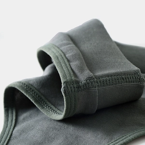 High-cut ribbed cotton thong in moss green featuring reinforced stitching for fitness