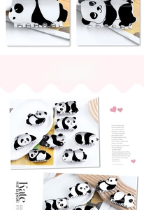 Detailed view of cute panda hair claws featuring high-gloss finish and metal teeth