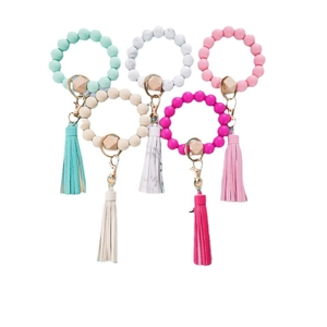 Five-pack silicone bead keychain bracelets with tassels in mint green and pink tones