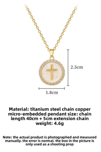Detail of round cross pendant with cubic zirconia and 18mm by 25mm dimensions