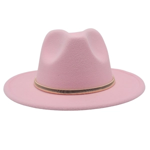 Detailed texture of a pink fedora hat with a golden metallic woven chain accessory