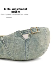 Detail of adjustable metal buckle on retro washed denim beret for custom fit