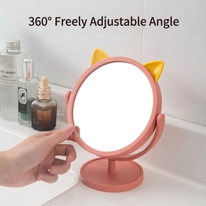 Rotating pink cat ear desktop makeup mirror with 360 degree adjustable round vanity glass