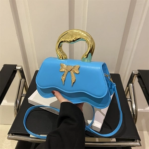 Chic blue wave flap handbag with gold metal handle and 3D bow accent for women